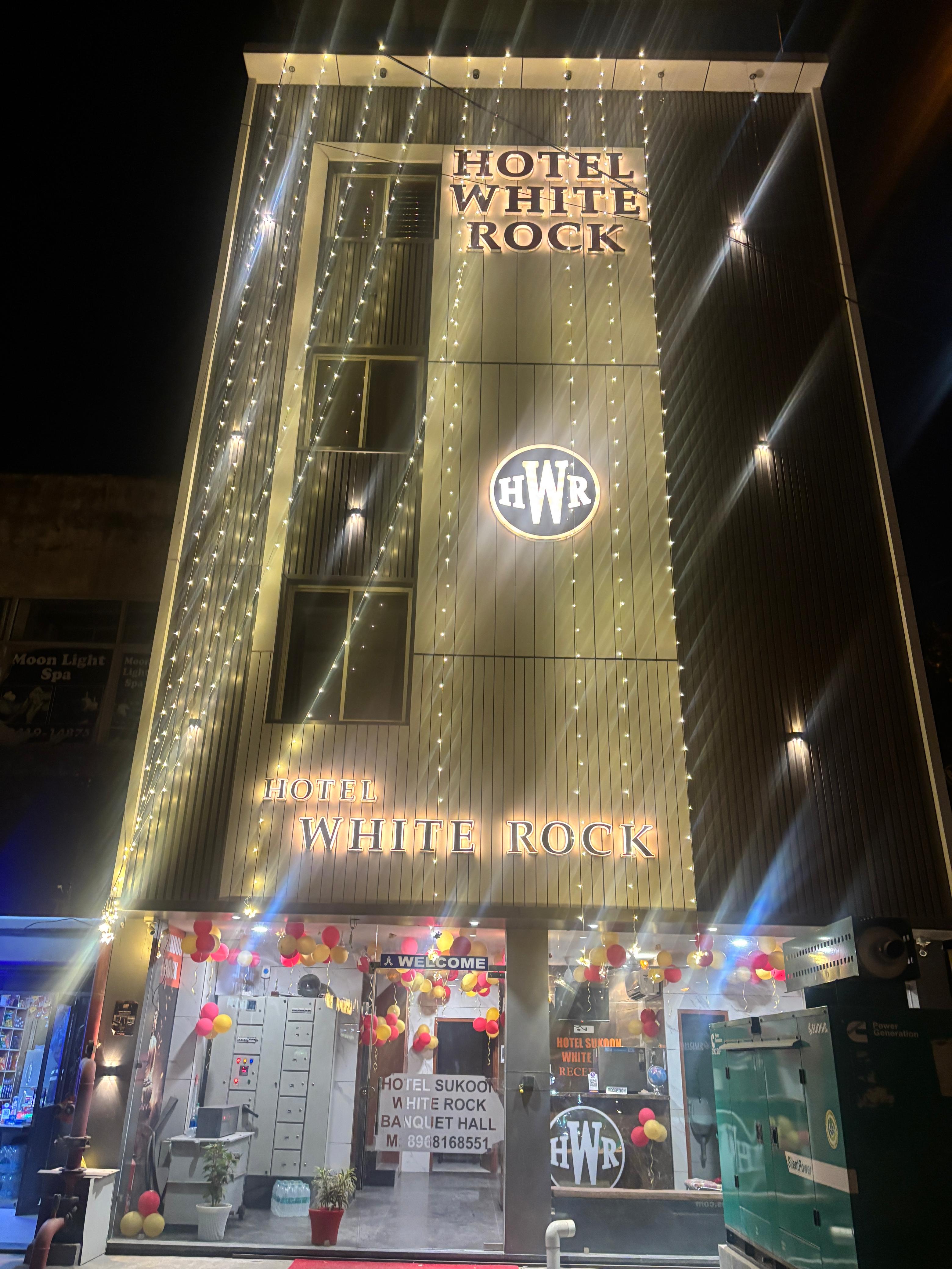 Hotel White Rock exterior at night